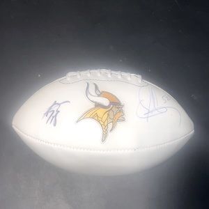 Signed Adrian Peterson And Chad Greenway football